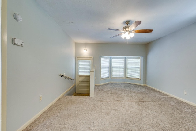 2023 Denise Dr, Columbia, TN 38401 - unfurnished room featuring carpet floors, baseboards, ceiling fan, and a smoke detector