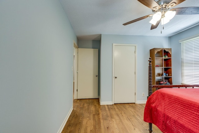 2023 Denise Dr, Columbia, TN 38401 - bedroom with wood finished floors, baseboards, a textured ceiling, and a ceiling fan