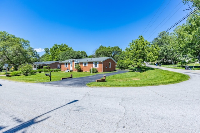 2023 Denise Dr, Columbia, TN 38401 - ranch-style house featuring a front yard and brick siding