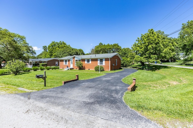 2023 Denise Dr, Columbia, TN 38401 - ranch-style home featuring brick siding and a front yard