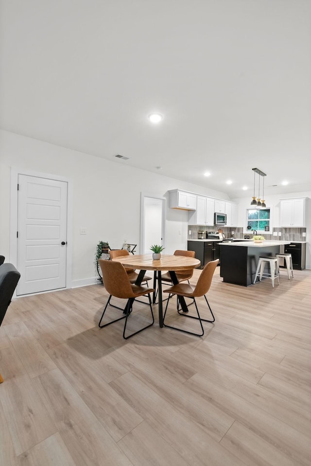 201 Dewberry Ct, Clarksville, TN 37042 - dining space featuring light wood-type flooring and recessed lighting