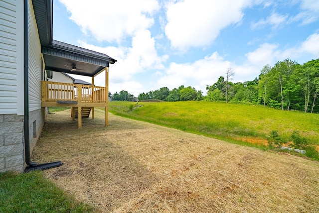 201 Dewberry Ct, Clarksville, TN 37042 - view of yard with a wooden deck, a ceiling fan, and stairs