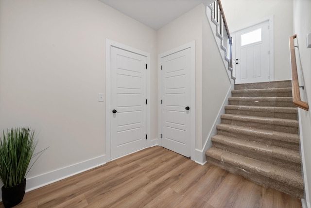 197 Dewberry Ct, Clarksville, TN 37042 - stairway featuring wood finished floors and baseboards