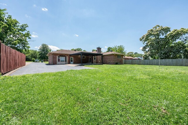 1619 Edgewood Dr, Lebanon, TN 37087 - view of yard with a patio area and driveway