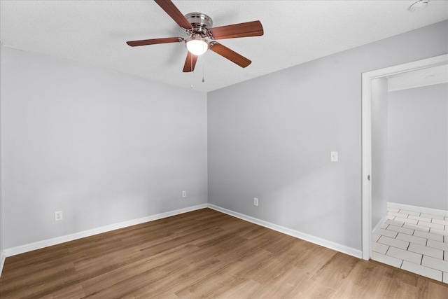 724 Shelly Ln, Rossville, GA 30741 - unfurnished room featuring wood finished floors and a ceiling fan