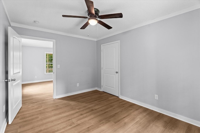 724 Shelly Ln, Rossville, GA 30741 - empty room featuring light wood-style flooring, a ceiling fan, and crown molding