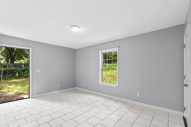 724 Shelly Ln, Rossville, GA 30741 - spare room featuring plenty of natural light and a textured ceiling