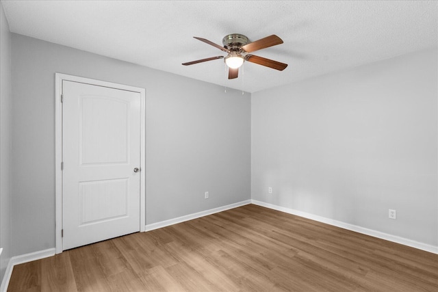 724 Shelly Ln, Rossville, GA 30741 - unfurnished room with light wood-type flooring, ceiling fan, and a textured ceiling