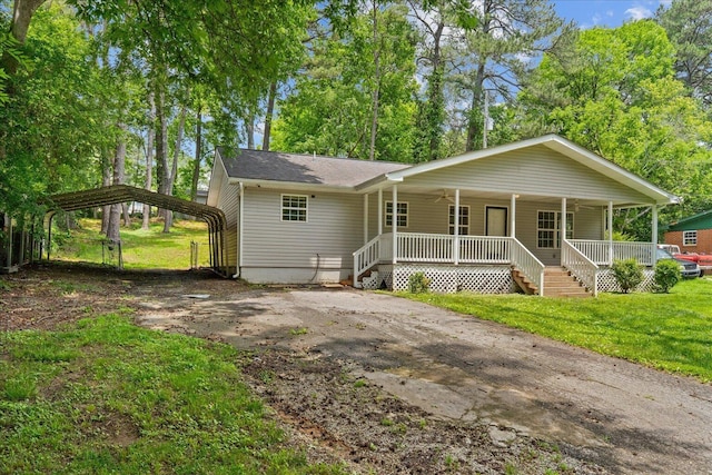 724 Shelly Ln, Rossville, GA 30741 - view of front of property with driveway, covered porch, a carport, a front lawn, and roof with shingles