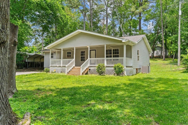 724 Shelly Ln, Rossville, GA 30741 - view of front of home with a porch, a detached carport, a front lawn, and ceiling fan