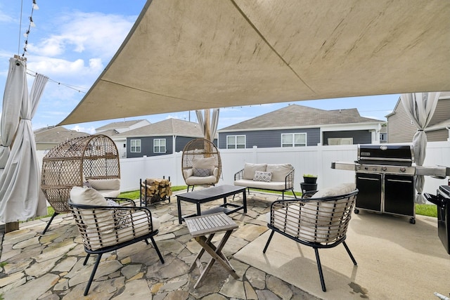 1006 Pepper Stone Dr, Lebanon, TN 37087 - fenced backyard with outdoor lounge area, a patio, and grilling area