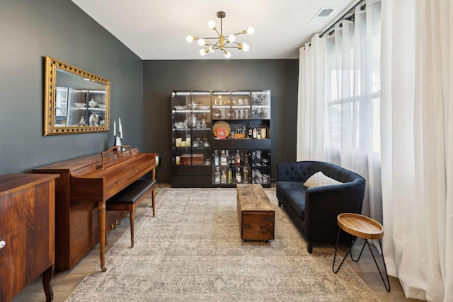 1006 Pepper Stone Dr, Lebanon, TN 37087 - living area with a chandelier and wood finished floors
