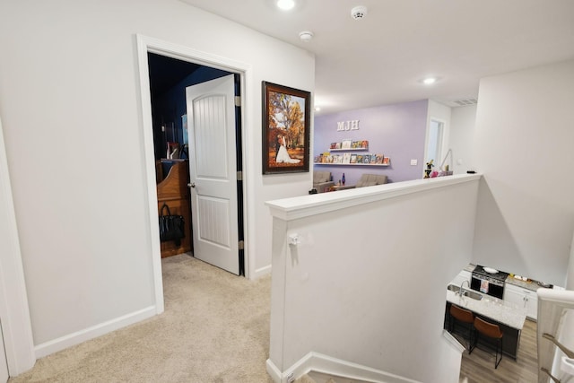 1006 Pepper Stone Dr, Lebanon, TN 37087 - hallway with baseboards, light colored carpet, and recessed lighting