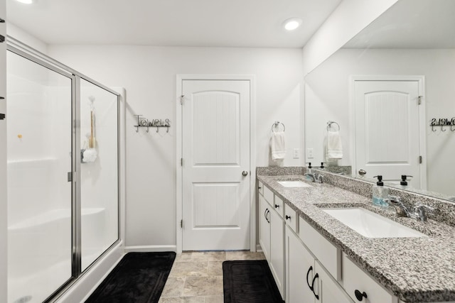 1006 Pepper Stone Dr, Lebanon, TN 37087 - full bath with double vanity, a stall shower, and recessed lighting