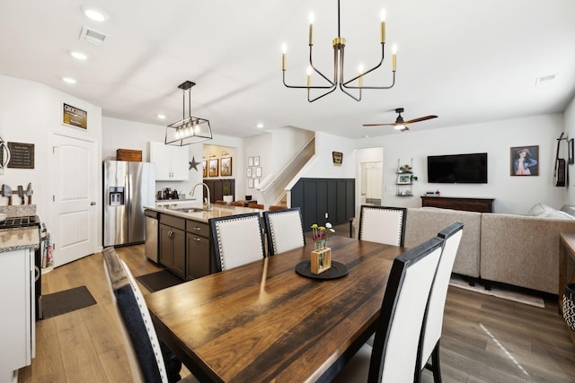 1006 Pepper Stone Dr, Lebanon, TN 37087 - dining space featuring a chandelier, recessed lighting, ceiling fan, and wood finished floors