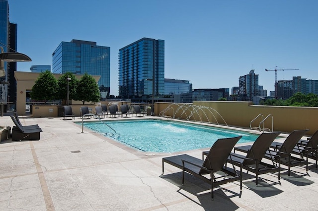 1510 Demonbreun St Unit 701, Nashville, TN 37203 - community pool with a skyline view and a patio area