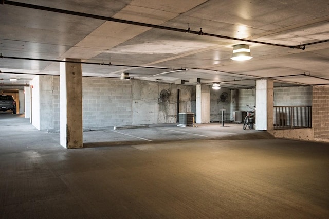 1510 Demonbreun St Unit 701, Nashville, TN 37203 - garage featuring central air condition unit and concrete block wall