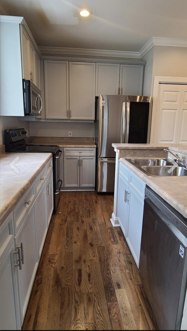 4316 Summercrest Blvd Unit 519, Antioch, TN 37013 - kitchen with stainless steel appliances, a sink, dark wood finished floors, crown molding, and gray cabinetry
