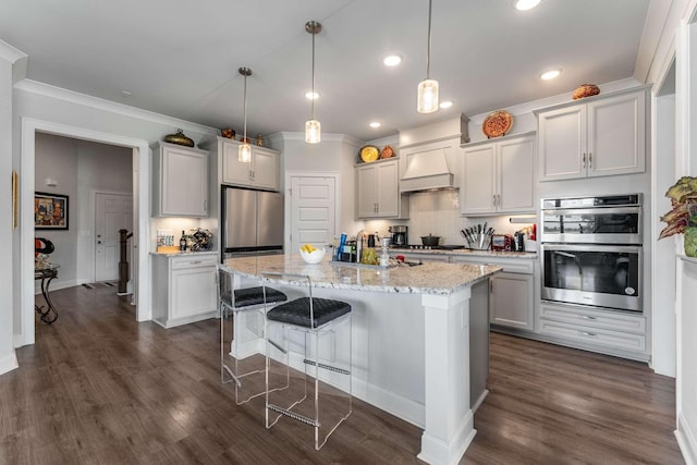134 Wynfield Blvd, Mount Juliet, TN 37122 - kitchen with stainless steel appliances, backsplash, dark wood-type flooring, recessed lighting, and crown molding