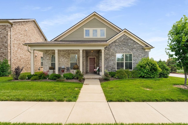 134 Wynfield Blvd, Mount Juliet, TN 37122 - view of front facade featuring a porch, a front yard, and brick siding