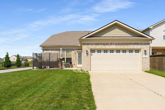 134 Wynfield Blvd, Mount Juliet, TN 37122 - craftsman-style home with a front yard, brick siding, driveway, and a garage