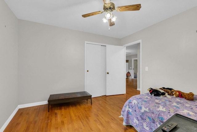 3071 Bayshore Dr, Cookeville, TN 38506 - bedroom with wood finished floors, ceiling fan, a closet, and baseboards