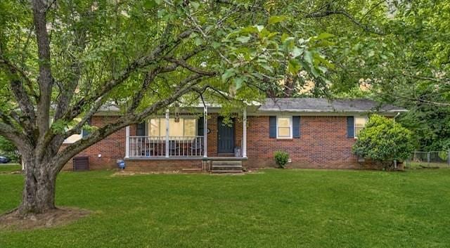 3071 Bayshore Dr, Cookeville, TN 38506 - ranch-style home featuring a porch, a front lawn, and brick siding