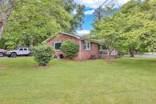 3071 Bayshore Dr, Cookeville, TN 38506 - view of property exterior with brick siding and a yard