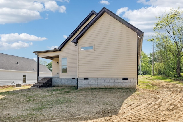827 Oconner St, Smithville, TN 37166 - view of property exterior featuring crawl space and central AC