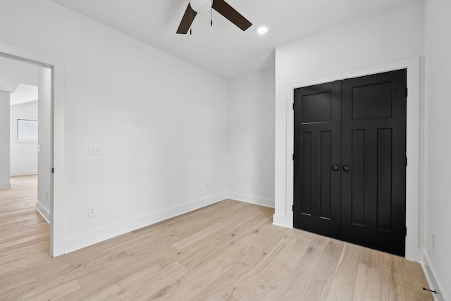 827 Oconner St, Smithville, TN 37166 - unfurnished bedroom featuring light wood finished floors, baseboards, ceiling fan, and a closet