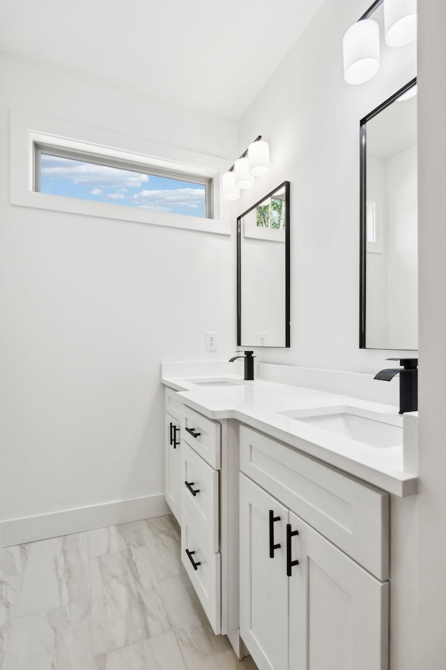 827 Oconner St, Smithville, TN 37166 - full bath with marble look tiles, double vanity, and baseboards