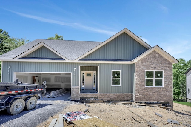 12165 Bull Run Lot # 159, Birchwood, TN 37308 - view of front of house with stone siding, roof with shingles, an attached garage, and board and batten siding