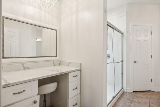 5405 Cliffstone Dr, Smyrna, TN 37167 - full bathroom featuring a stall shower, tile patterned flooring, vanity, and a chandelier