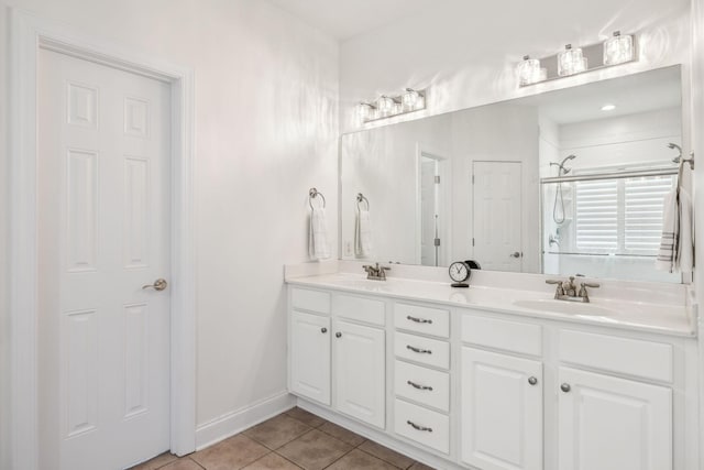 5405 Cliffstone Dr, Smyrna, TN 37167 - full bathroom featuring tile patterned floors, double vanity, an enclosed shower, and baseboards