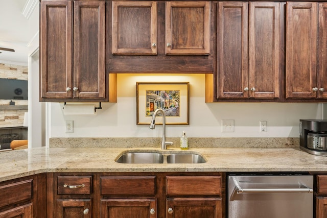 5405 Cliffstone Dr, Smyrna, TN 37167 - kitchen with dishwasher, a sink, dark brown cabinets, and light stone countertops
