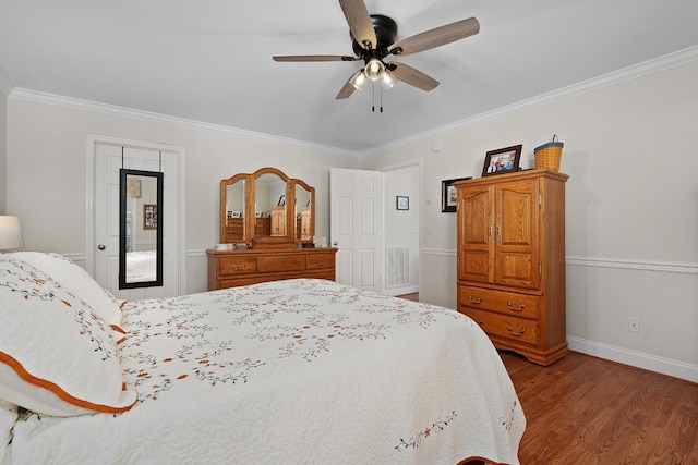 72 Anchor Dr, Rossville, GA 30741 - bedroom with crown molding, wood finished floors, baseboards, and ceiling fan