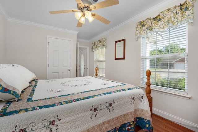 72 Anchor Dr, Rossville, GA 30741 - bedroom with baseboards, wood finished floors, ornamental molding, and ceiling fan