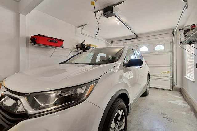 72 Anchor Dr, Rossville, GA 30741 - garage with a garage door opener and baseboards