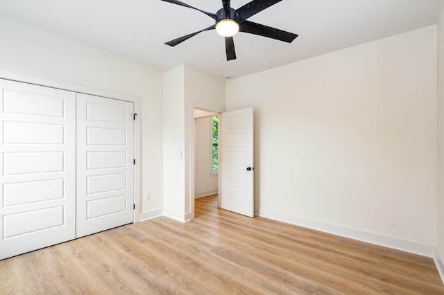 311 N 9th St, Nashville, TN 37206 - unfurnished bedroom featuring light wood finished floors, baseboards, a closet, and a ceiling fan
