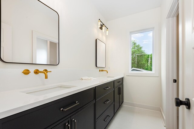 311 N 9th St, Nashville, TN 37206 - full bath with double vanity and baseboards