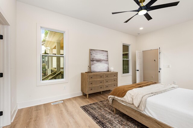 311 N 9th St, Nashville, TN 37206 - bedroom featuring light wood-type flooring, baseboards, and a ceiling fan