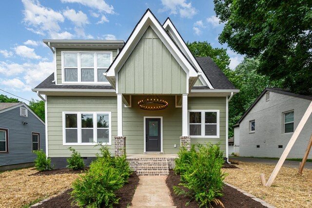 311 N 9th St, Nashville, TN 37206 - craftsman house with covered porch, a shingled roof, board and batten siding, and crawl space