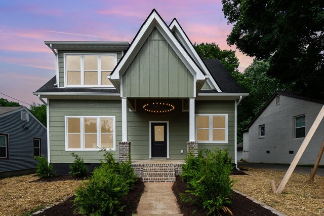 311 N 9th St, Nashville, TN 37206 - craftsman-style house with a porch, board and batten siding, a shingled roof, and crawl space