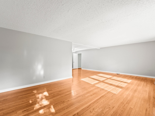 806 Pleasant View Dr, Winchester, TN 37398 - spare room with a textured ceiling, baseboards, and light wood-style flooring