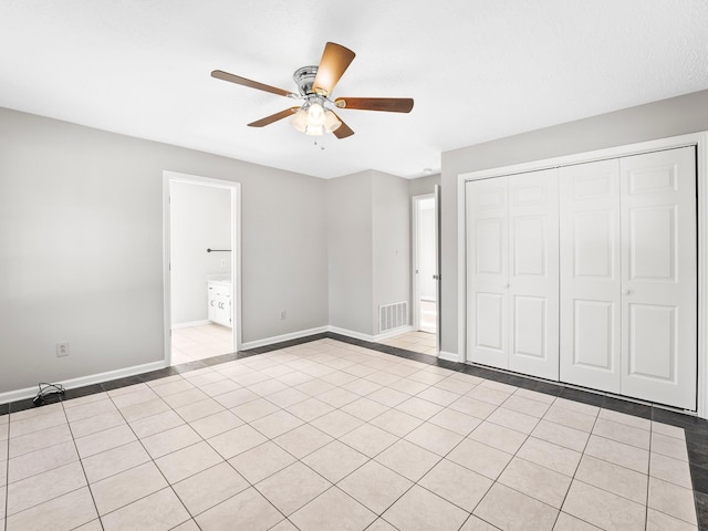 806 Pleasant View Dr, Winchester, TN 37398 - unfurnished bedroom featuring a closet, baseboards, light tile patterned floors, and a ceiling fan