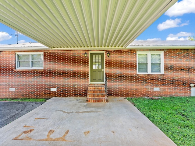 806 Pleasant View Dr, Winchester, TN 37398 - entrance to property with crawl space, a patio area, brick siding, and metal roof