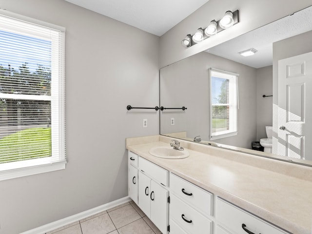 806 Pleasant View Dr, Winchester, TN 37398 - bathroom with vanity, toilet, tile patterned floors, and baseboards