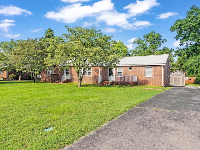 806 Pleasant View Dr, Winchester, TN 37398 - view of front facade featuring brick siding, a front yard, and asphalt driveway