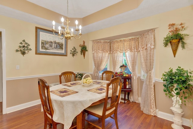 108 Dalewood Cir, Chickamauga, GA 30707 - dining area with wood finished floors, a chandelier, and baseboards