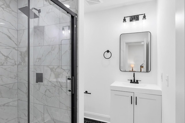 1104 Howell St, Hopkinsville, KY 42240 - full bathroom featuring a marble finish shower, vanity, and baseboards